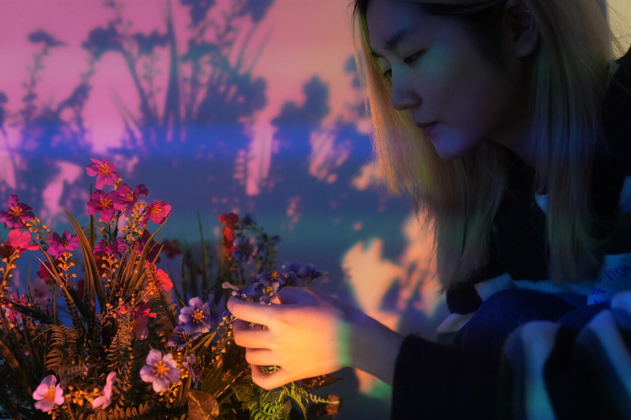 The first memorial we showcased was through the eyes of a butterfly, so we used artificial flowers and plants to create a &quot;garden&quot;.